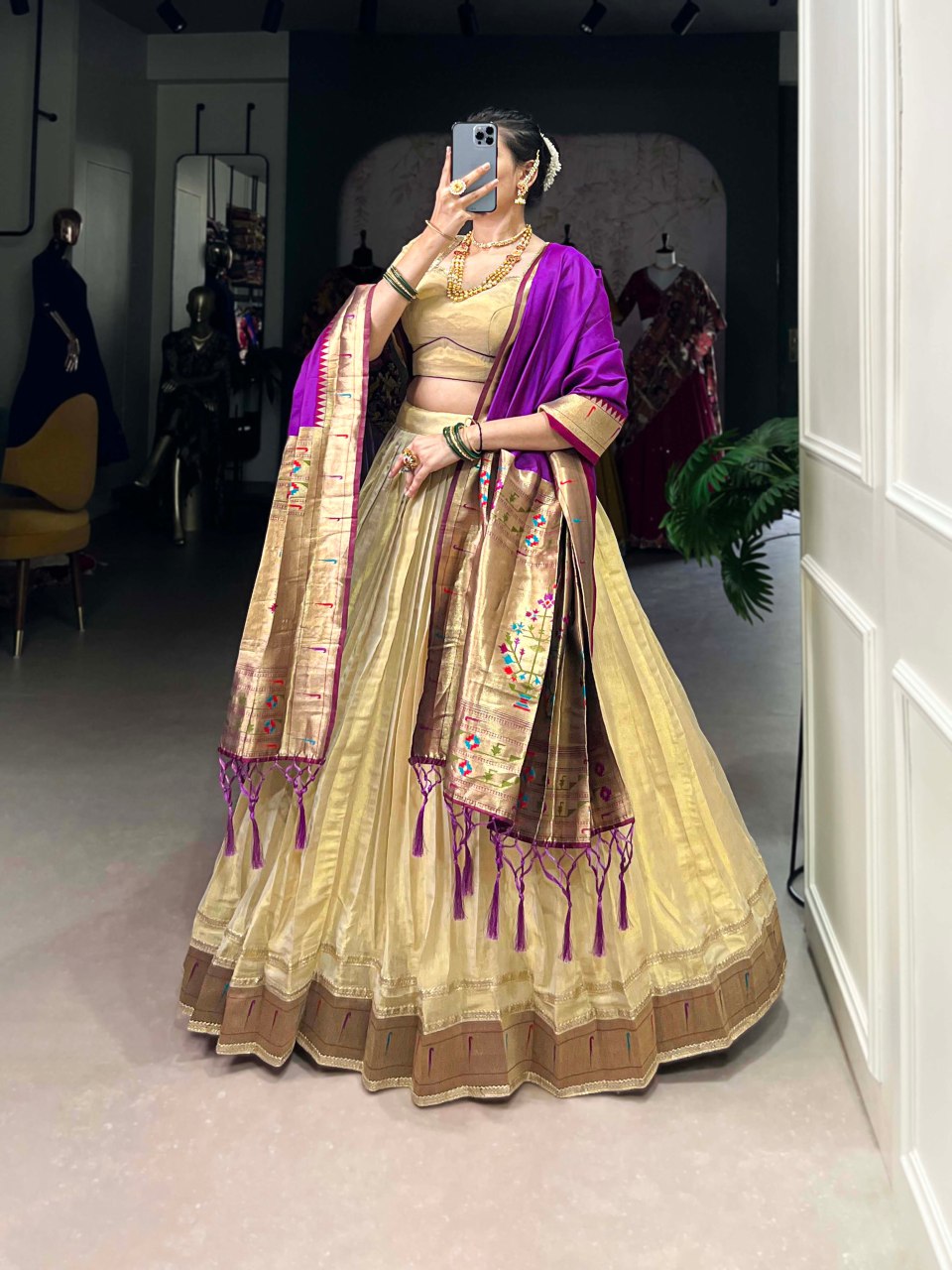 Cream silk lehenga choli with Paithani lace border and jacquard zari dupatta