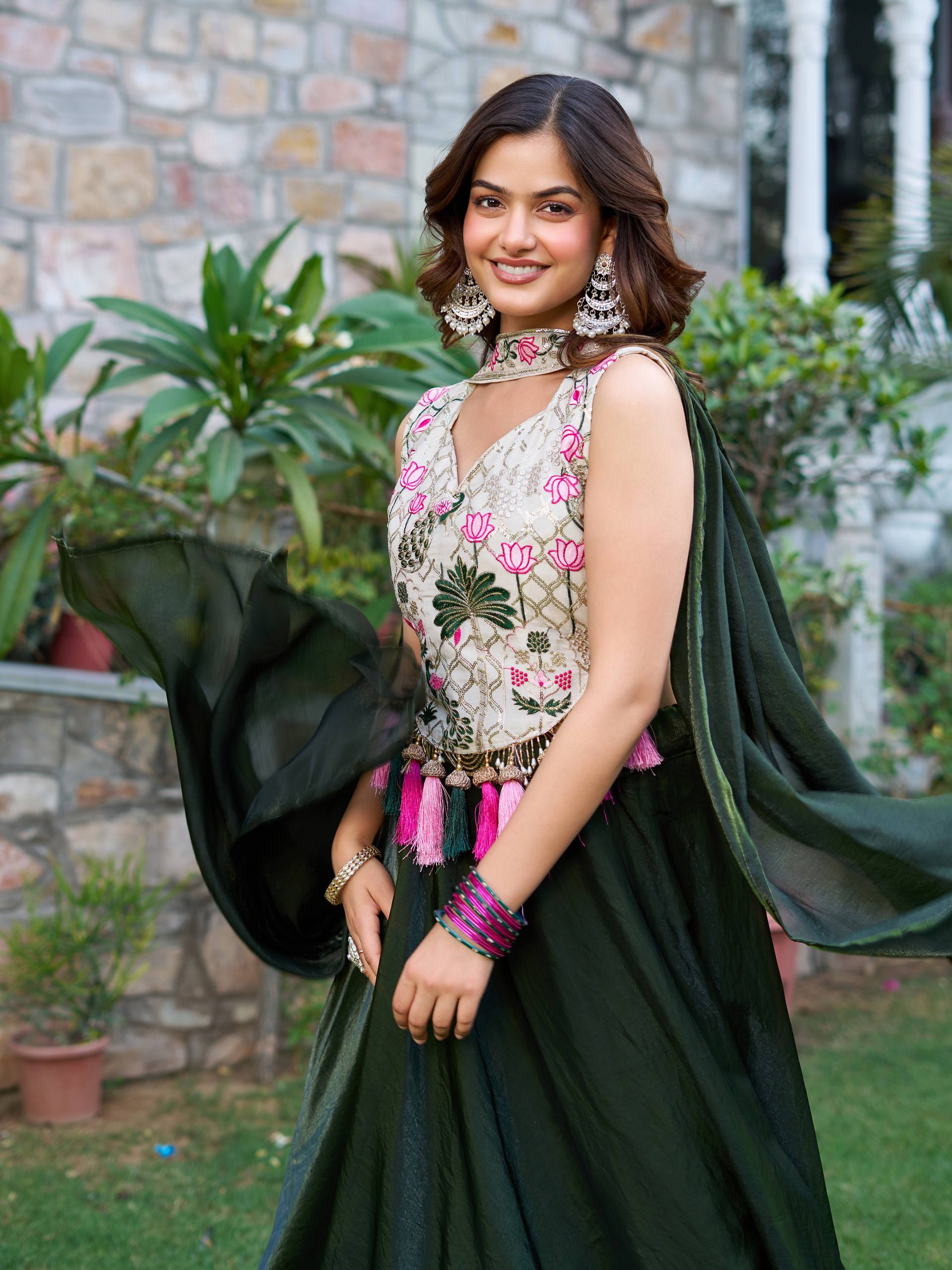 Tanu green tissue silk lehenga choli with sequins thread work and dupatta