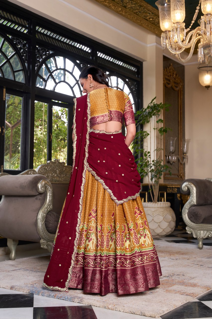 Yellow Kanchipuram silk printed lehenga choli with embroidered dupatta