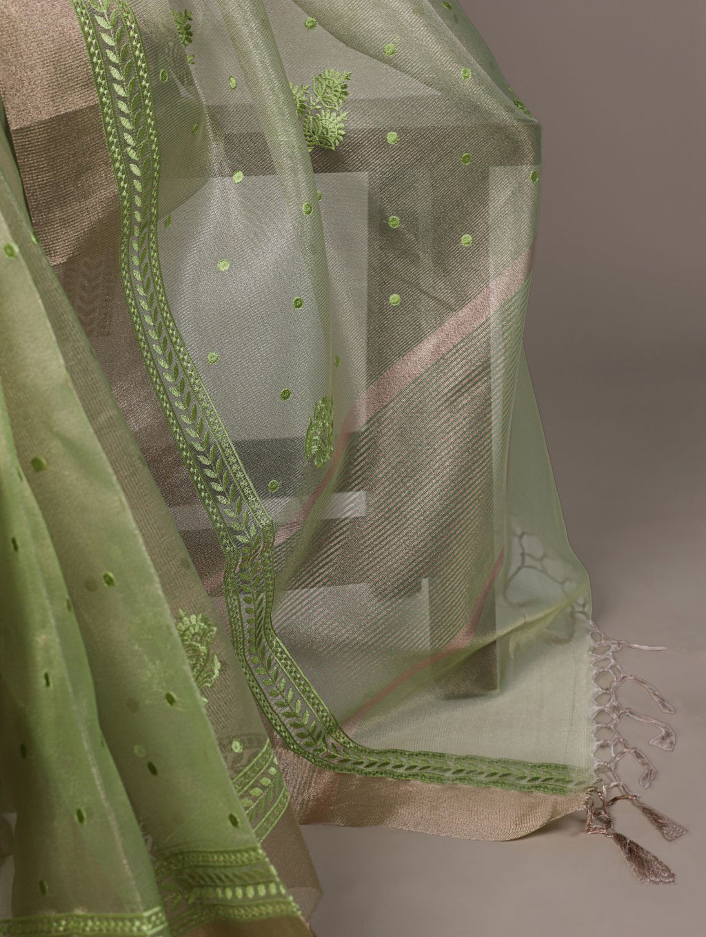 Pista green poly shimmer thread embroidered saree with unstitched blouse