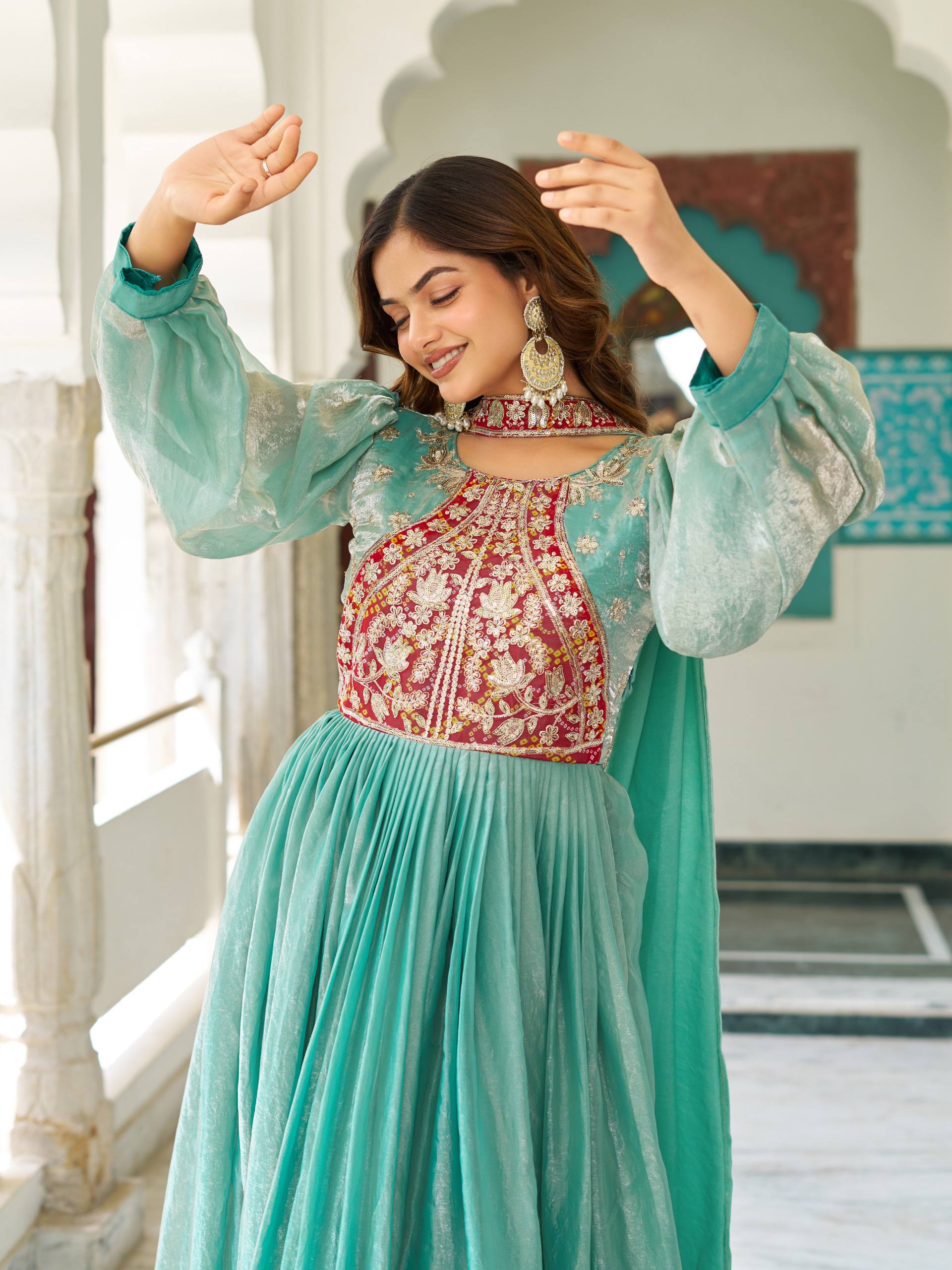 Ritu sea green Fendy silk gown with sequins thread embroidery and dupatta