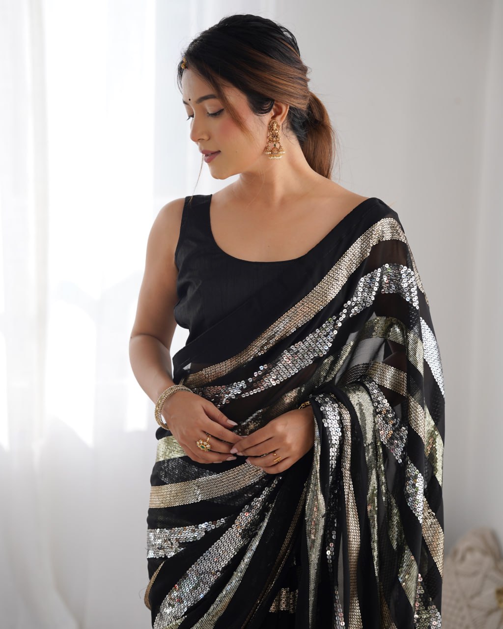 Black georgette sequin embroidered Kira designer saree