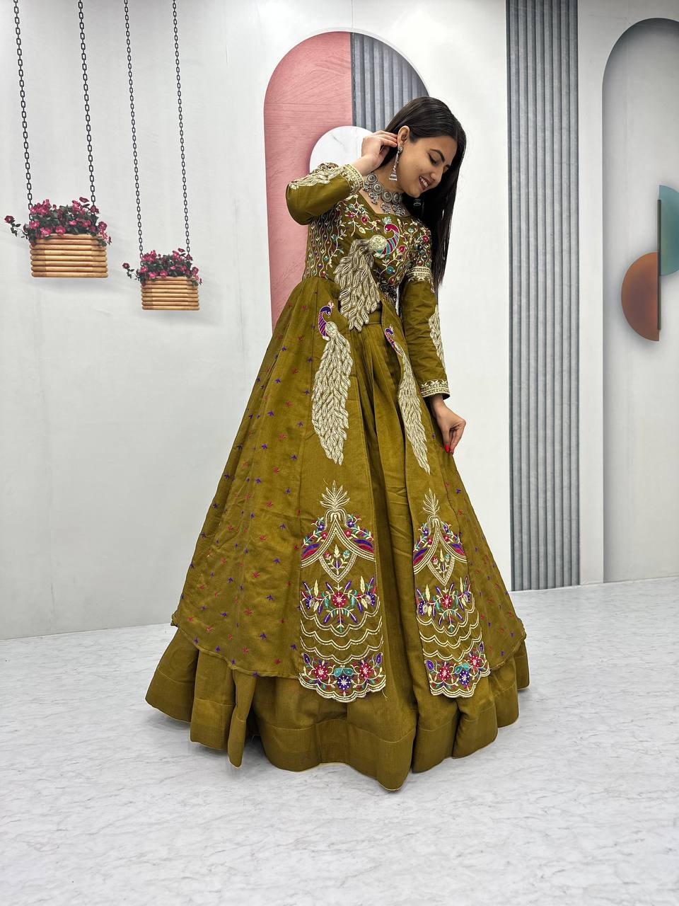 Mani olive green Vichitra silk crop top peacock design lehenga with embroidered shrug