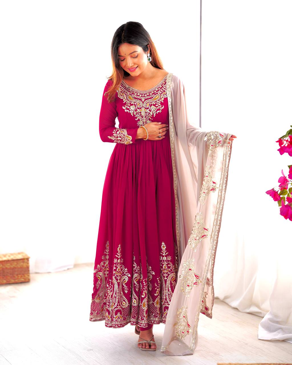 Pink georgette embroidered Tejvini designer gown