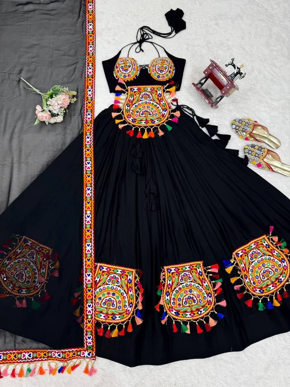 Black georgette lehenga choli with Gamthi embroidery and mirror work