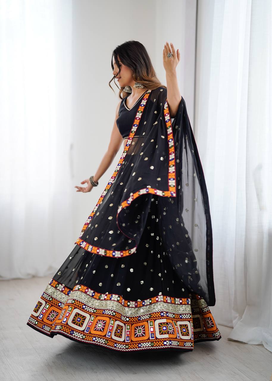 Black georgette lehenga choli with Gamthi embroidery and mirror work