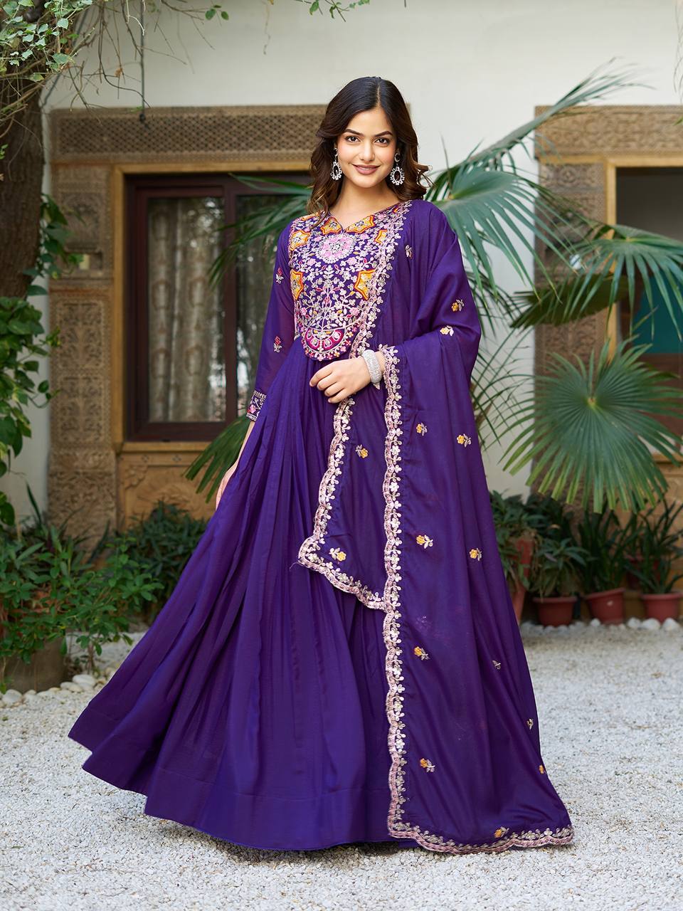 Pink heavy sequins thread embroidered georgette gown for wedding functions