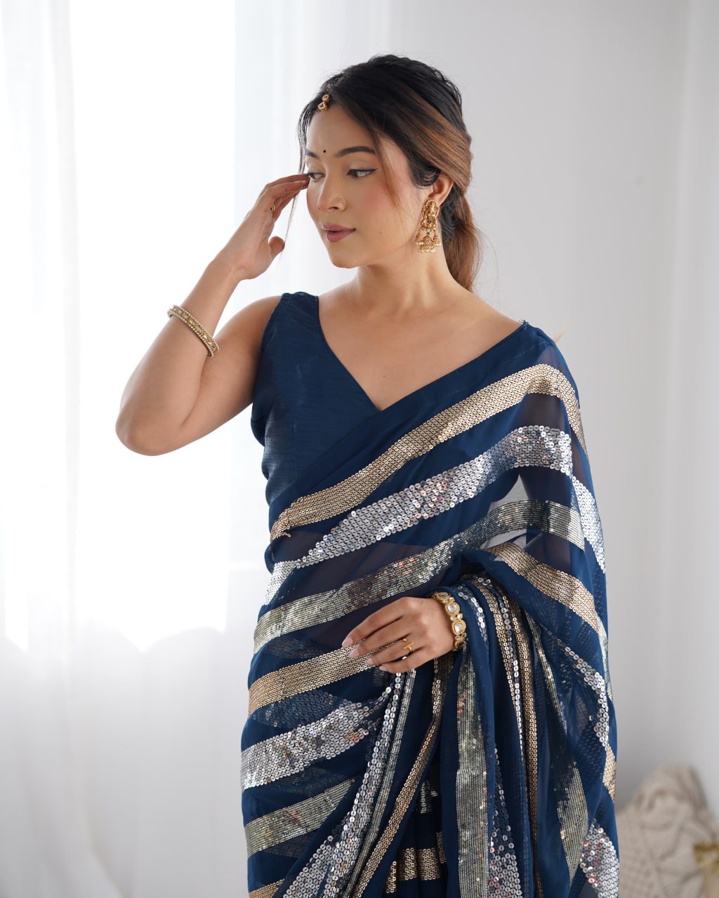 Navy blue georgette sequin embroidered Kira designer saree
