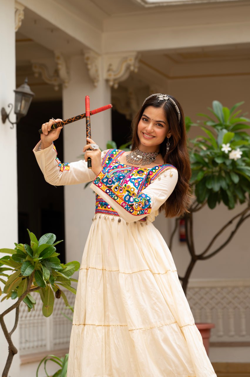 Off-white cotton gown with Kutchi Gamthi mirror embroidery and lace