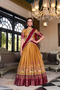 Yellow Kanchipuram silk printed lehenga choli with embroidered dupatta