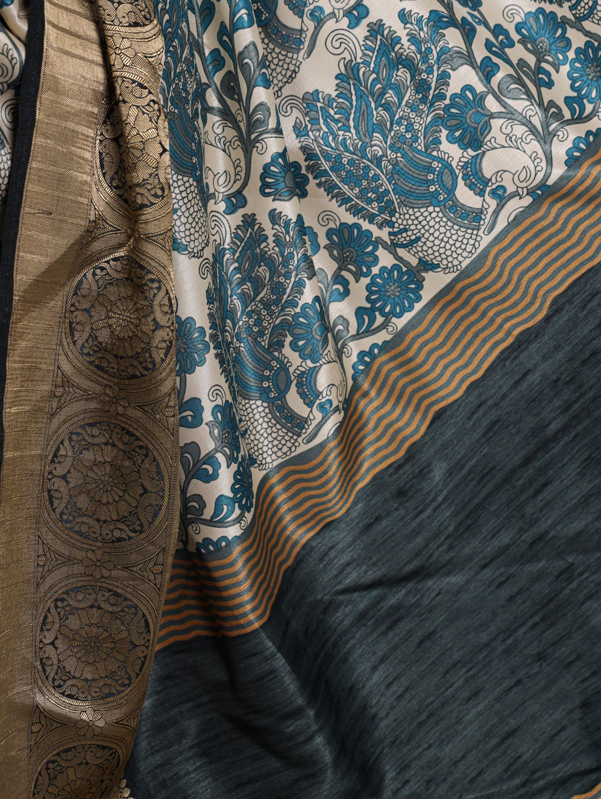 Teal blue tasar silk printed saree with viscose border and blouse