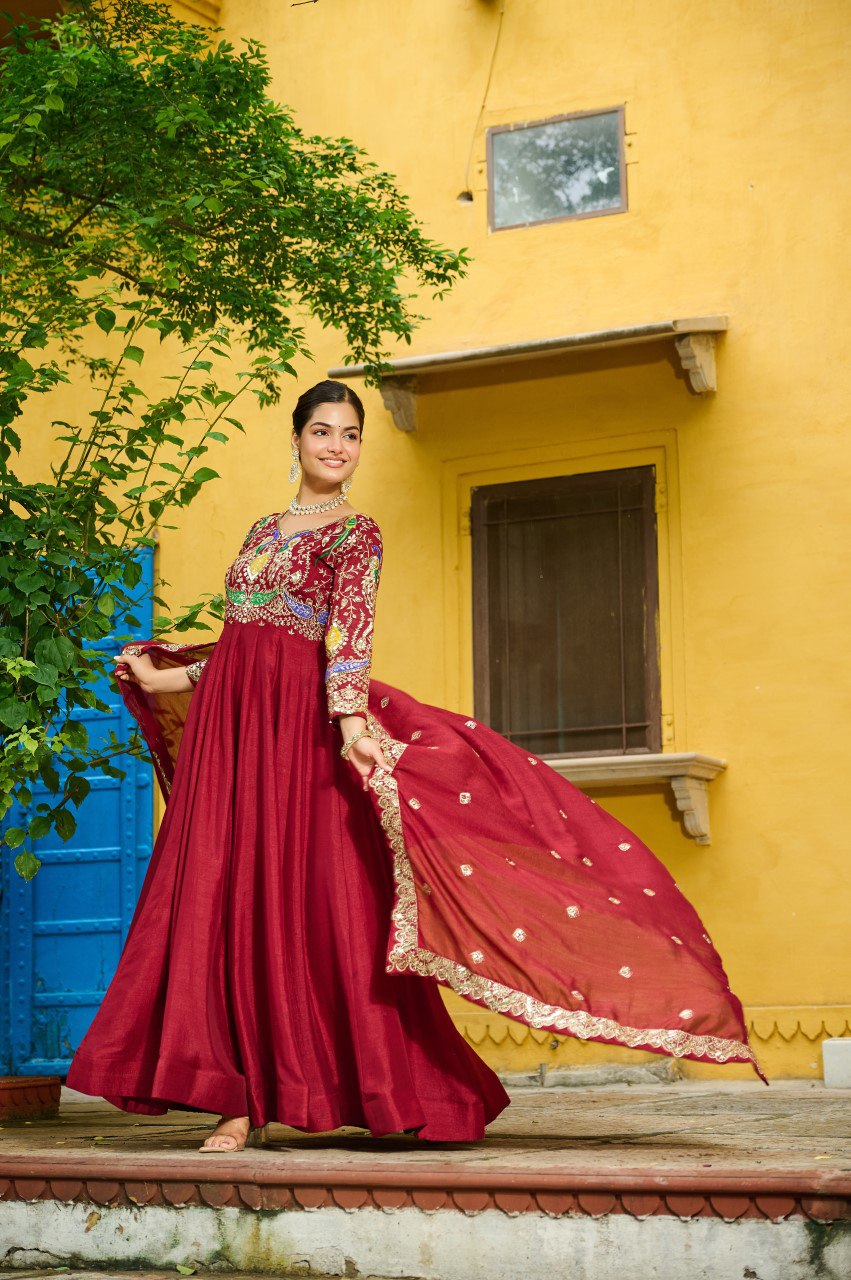 Maroon silk gown with multi thread zari embroidery and dupatta