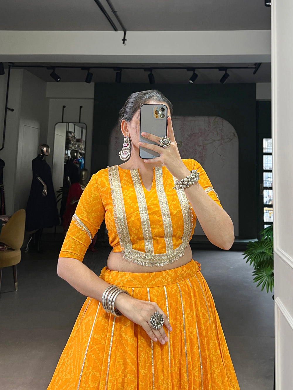 Yellow chiffon lehenga choli with Bandhej print and Gota Patti lace