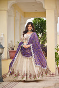 Amla off-white tissue silk lehenga choli with sequins thread work and purple Bandhej dupatta