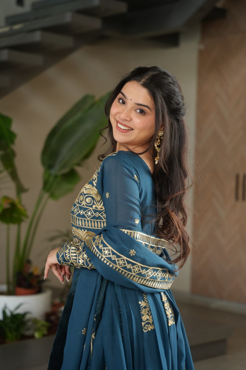 Teal blue chinnon embroidered gown with sequins work and dupatta