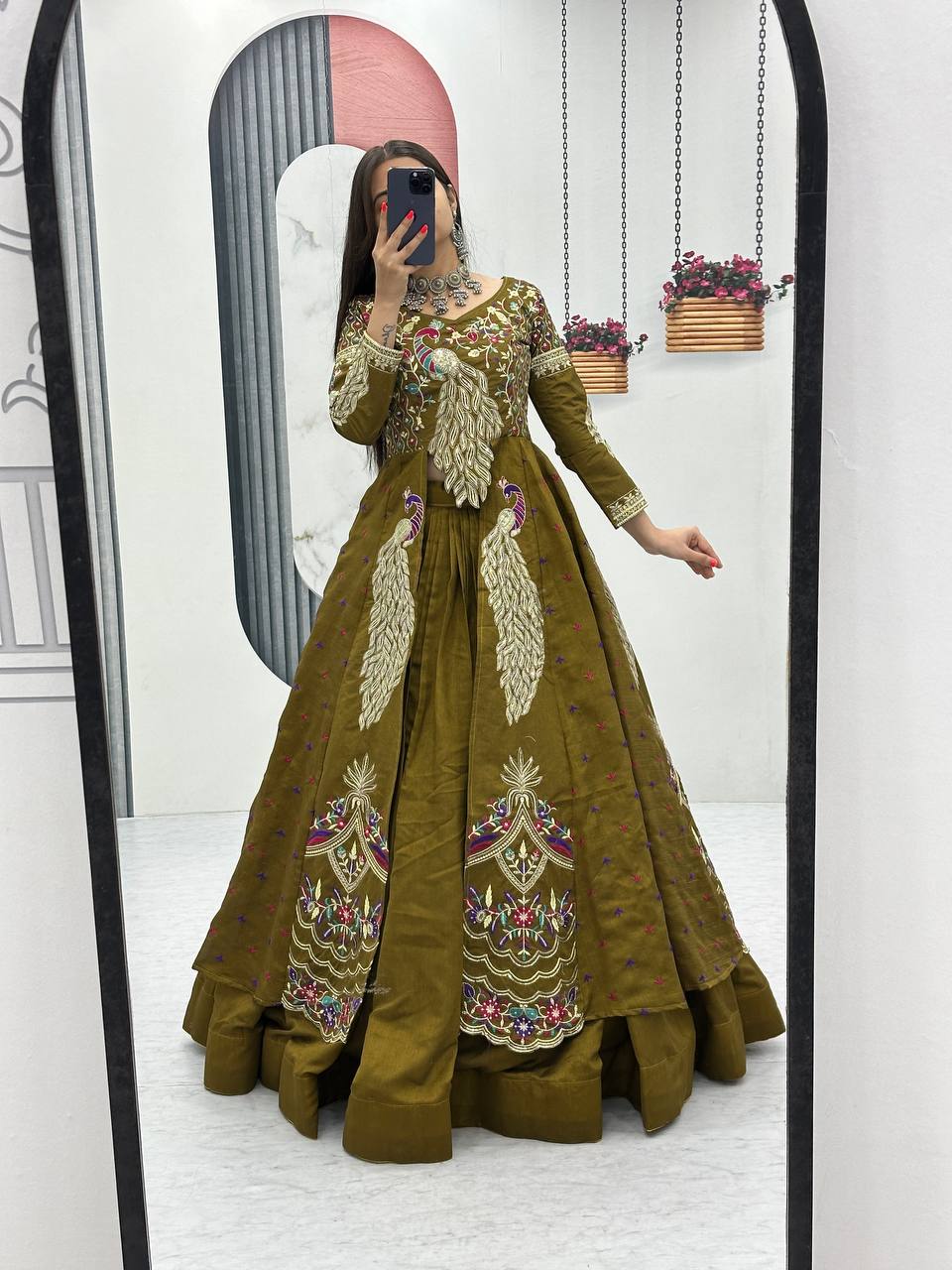 Mani olive green Vichitra silk crop top peacock design lehenga with embroidered shrug