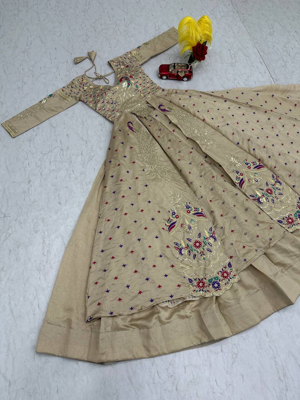 Mani beige Vichitra silk crop top peacock design lehenga with embroidered shrug