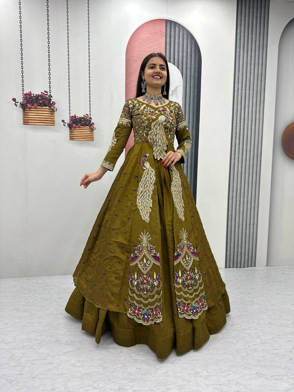 Mani olive green Vichitra silk crop top peacock design lehenga with embroidered shrug