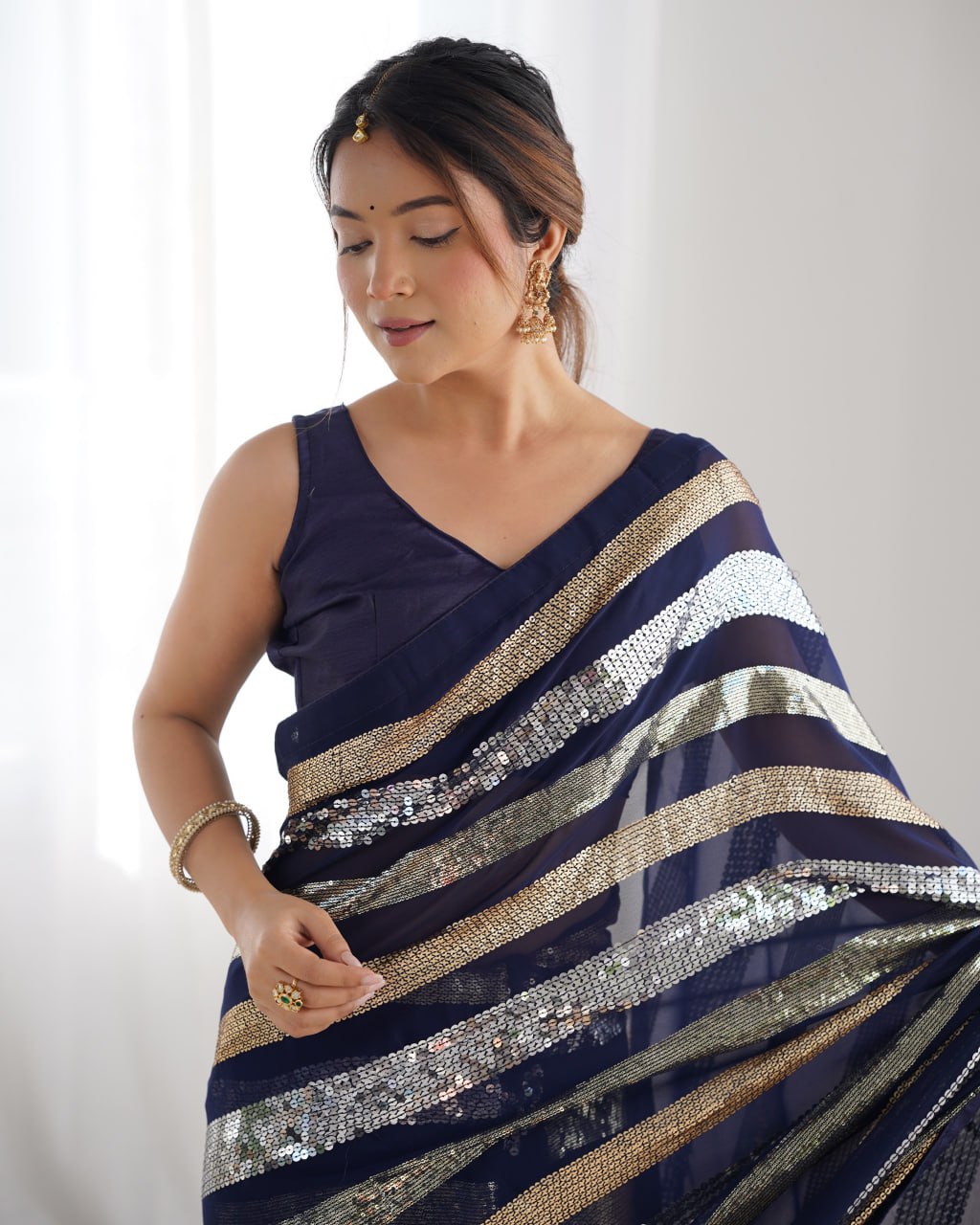 Deep blue georgette sequin embroidered Kira designer saree