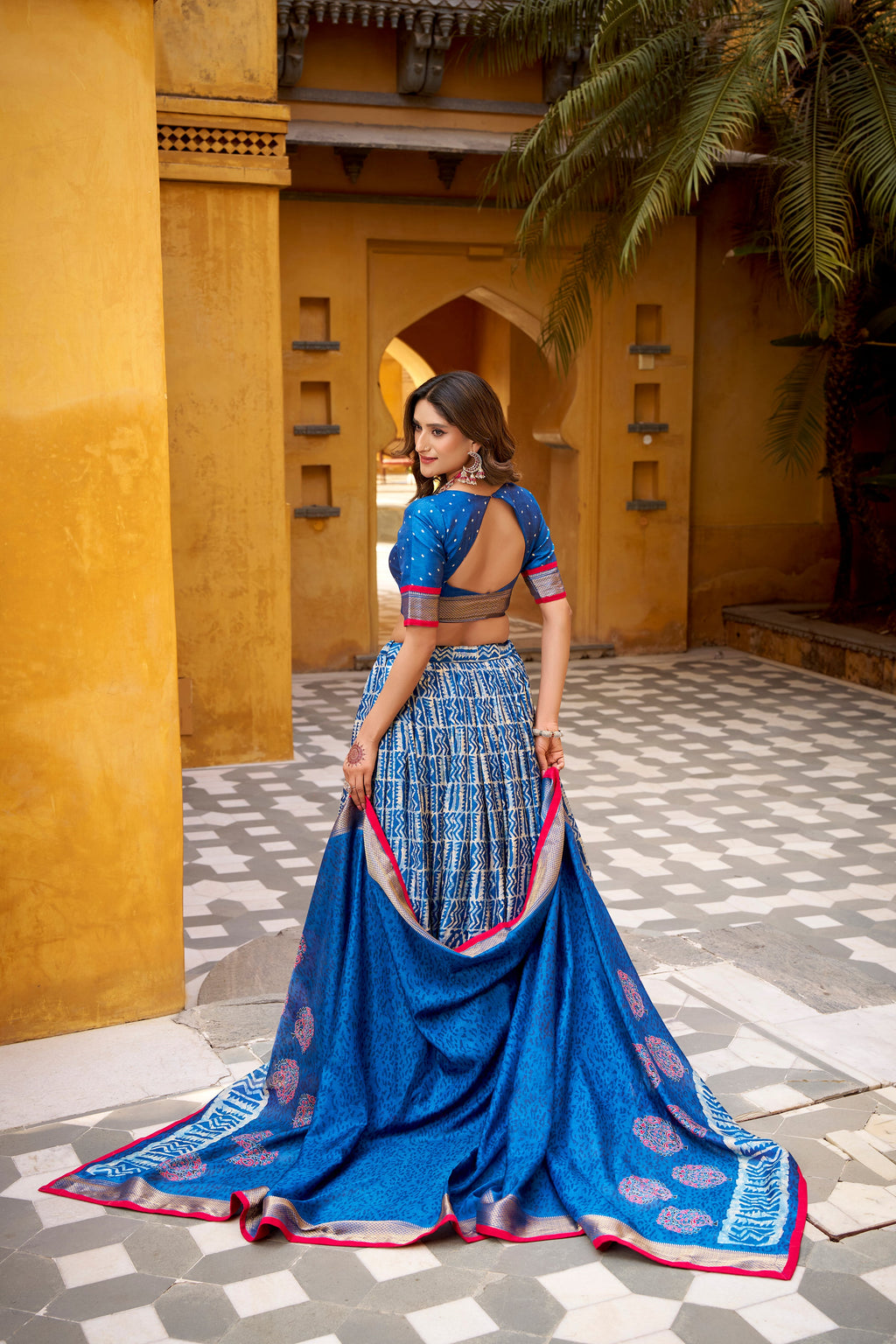 Girija blue Dola silk batik print lehenga choli with zari weaving work