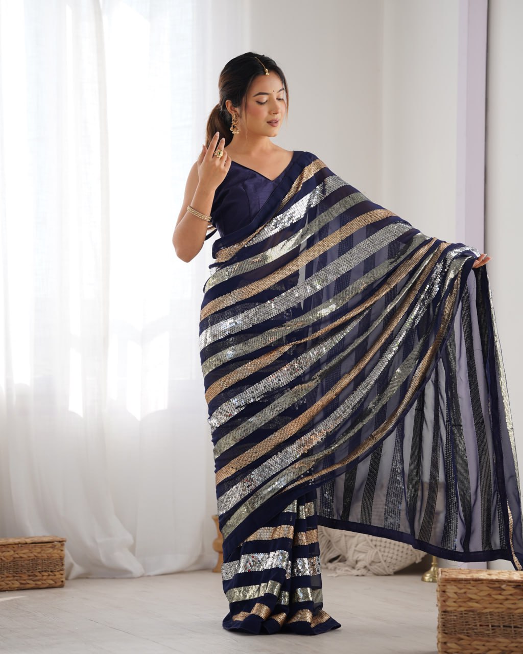 Deep blue georgette sequin embroidered Kira designer saree