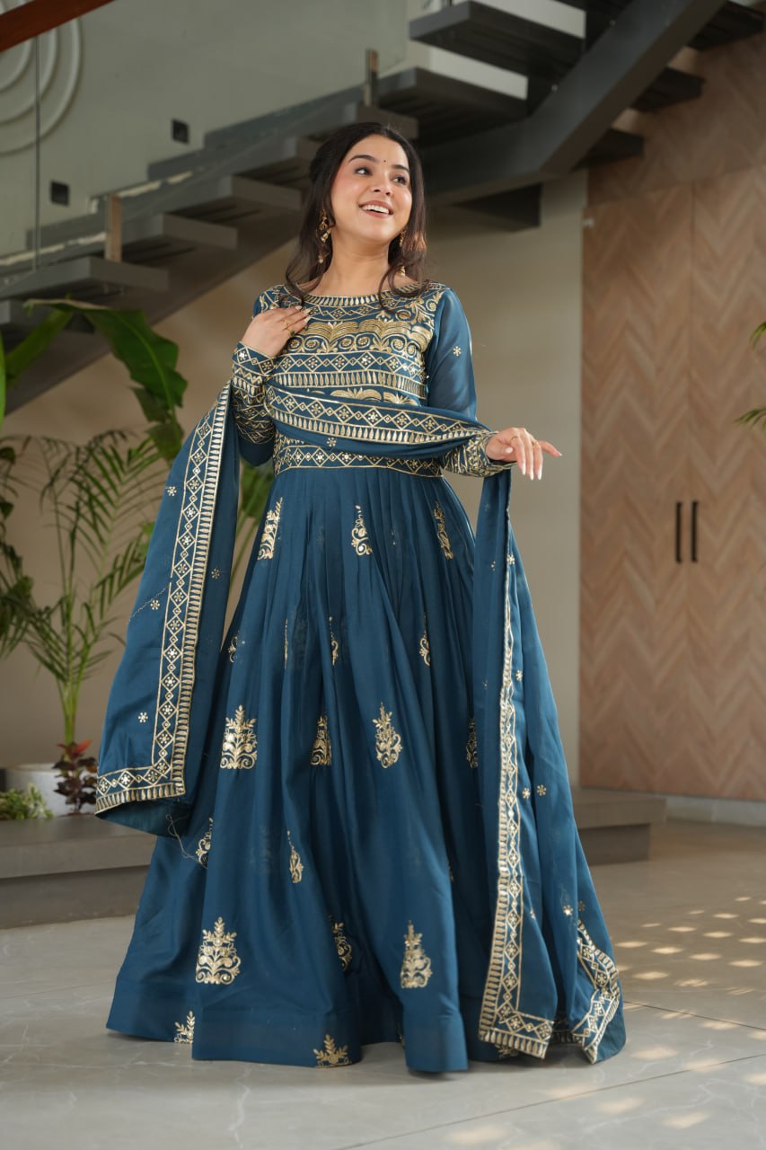 Teal blue chinnon embroidered gown with sequins work and dupatta