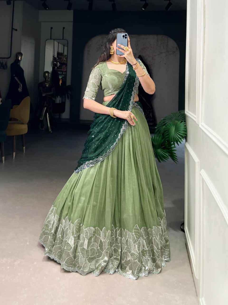 Pista green glossy lehenga choli with silver embroidery and hotfix work