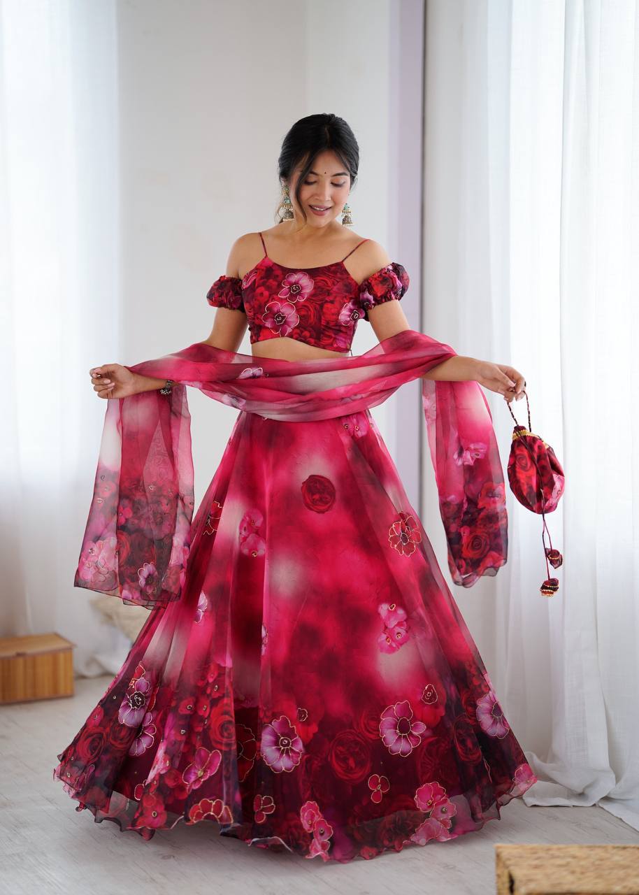 Red pure organza digital print zari work lehenga choli with batwa bag