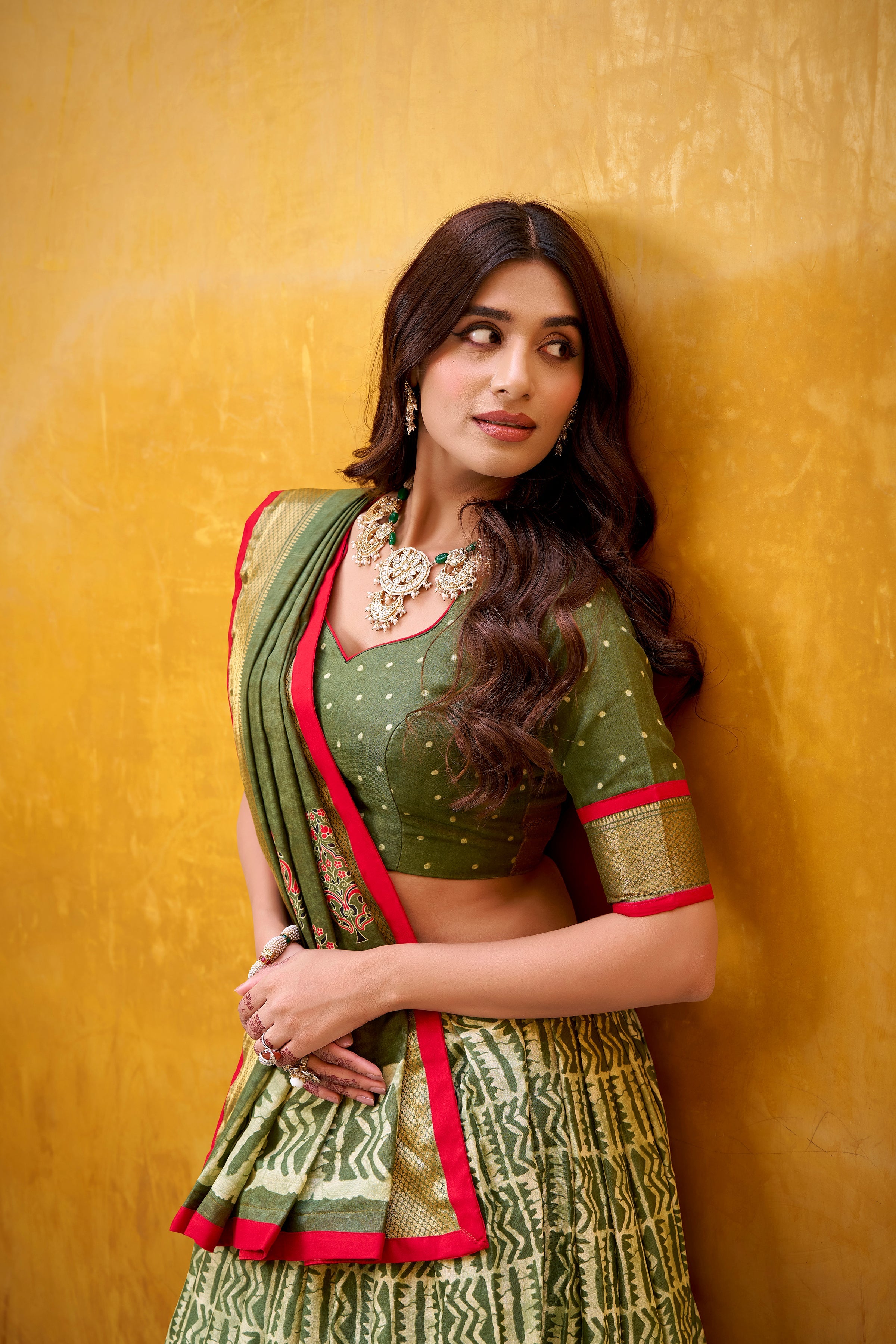 Girija mehendi green Dola silk batik print lehenga choli with zari weaving work