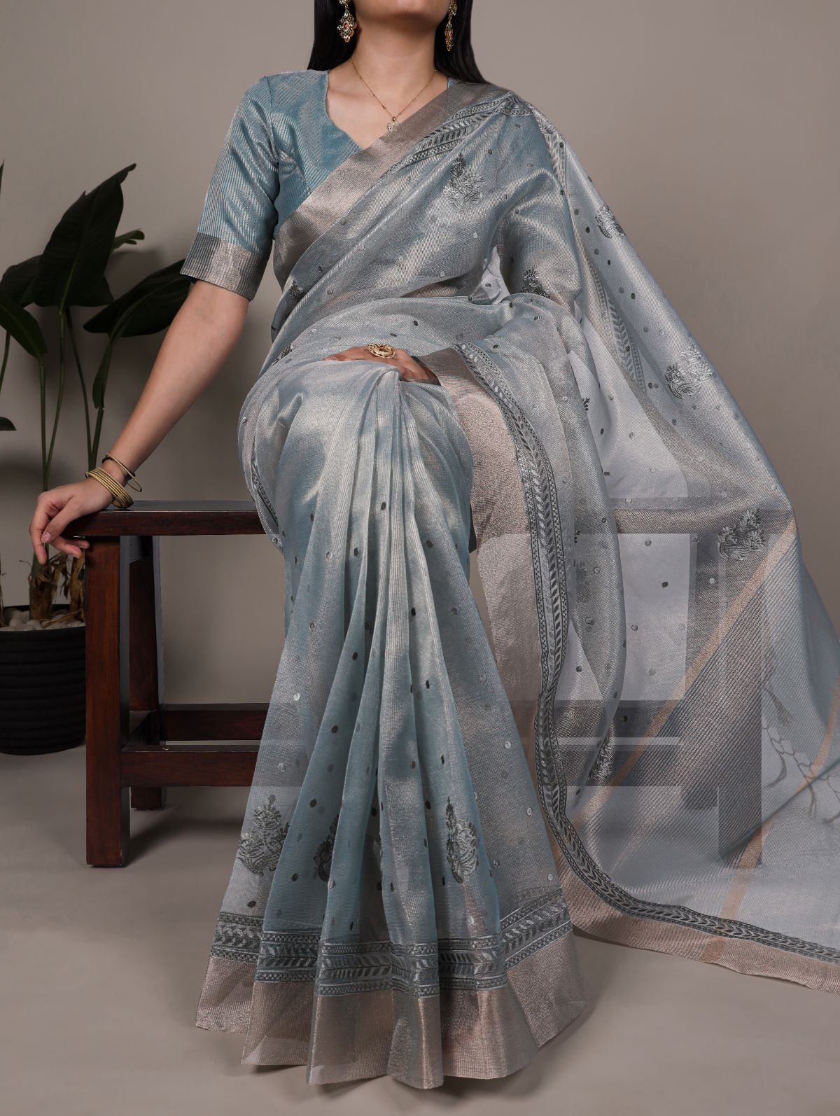 Sky blue poly shimmer thread embroidered saree with unstitched blouse