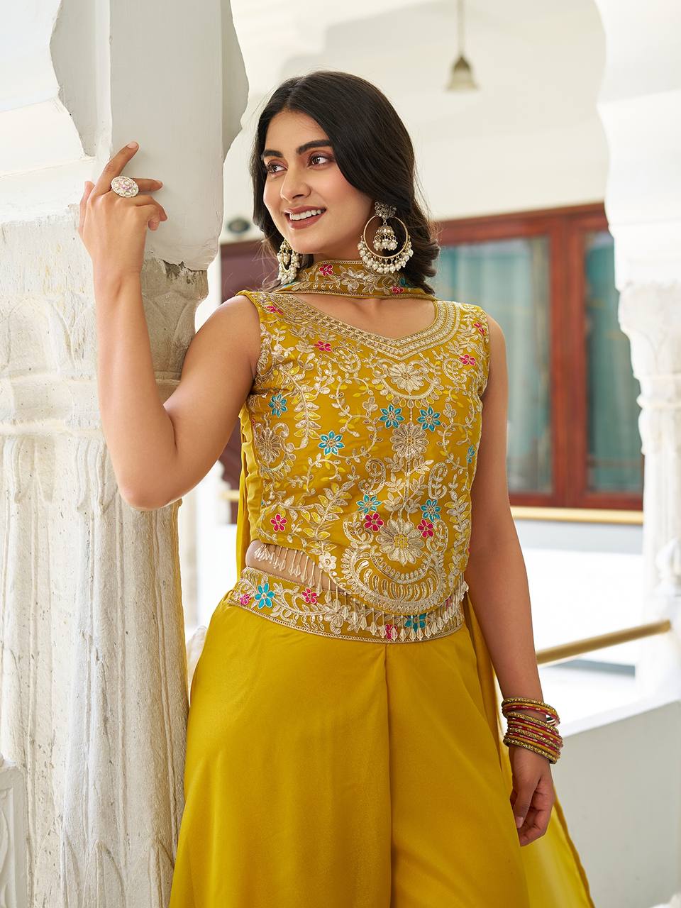 Stuti mustard yellow star georgette top palazzo set with sequins thread embroidery