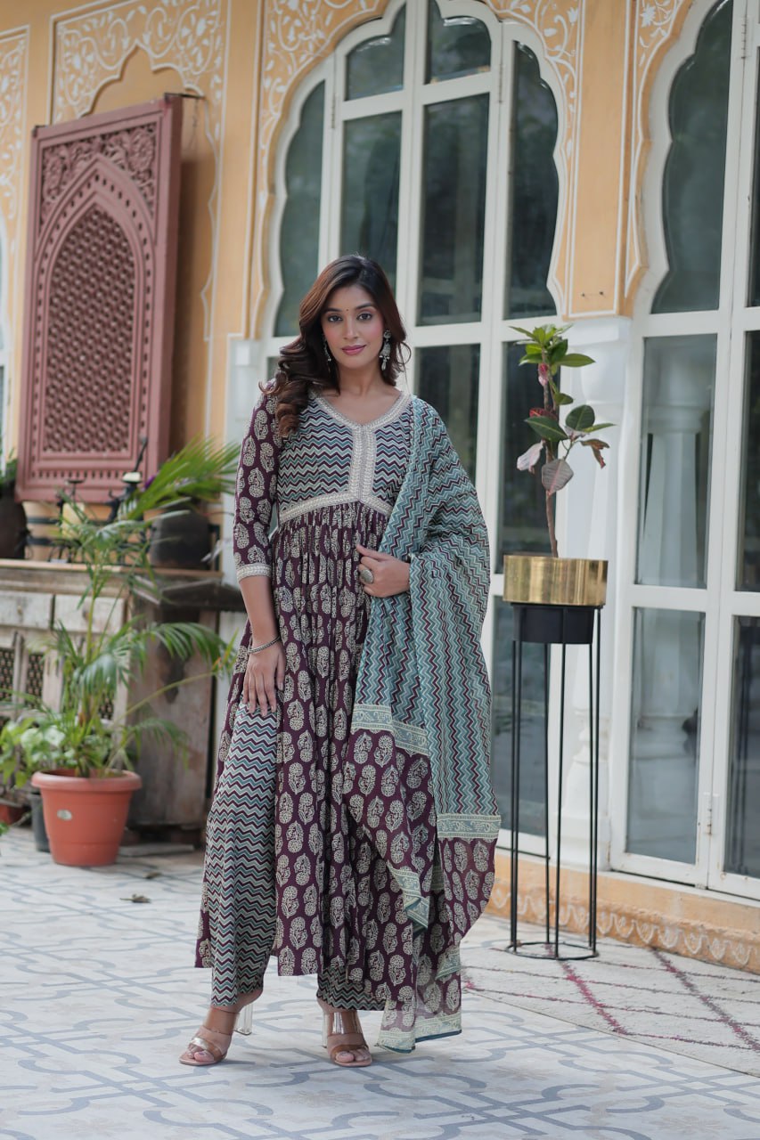 Brown printed pure cotton kurti set for women, lightweight kurti with pant and dupatta, daily wear cotton kurti set, breathable cotton ethnic wear for summer, stylish printed kurta set for casual and office wear, Indian cotton kurti pant set online, elegant brown ethnic suit for women, pure cotton kurti set with traditional print.