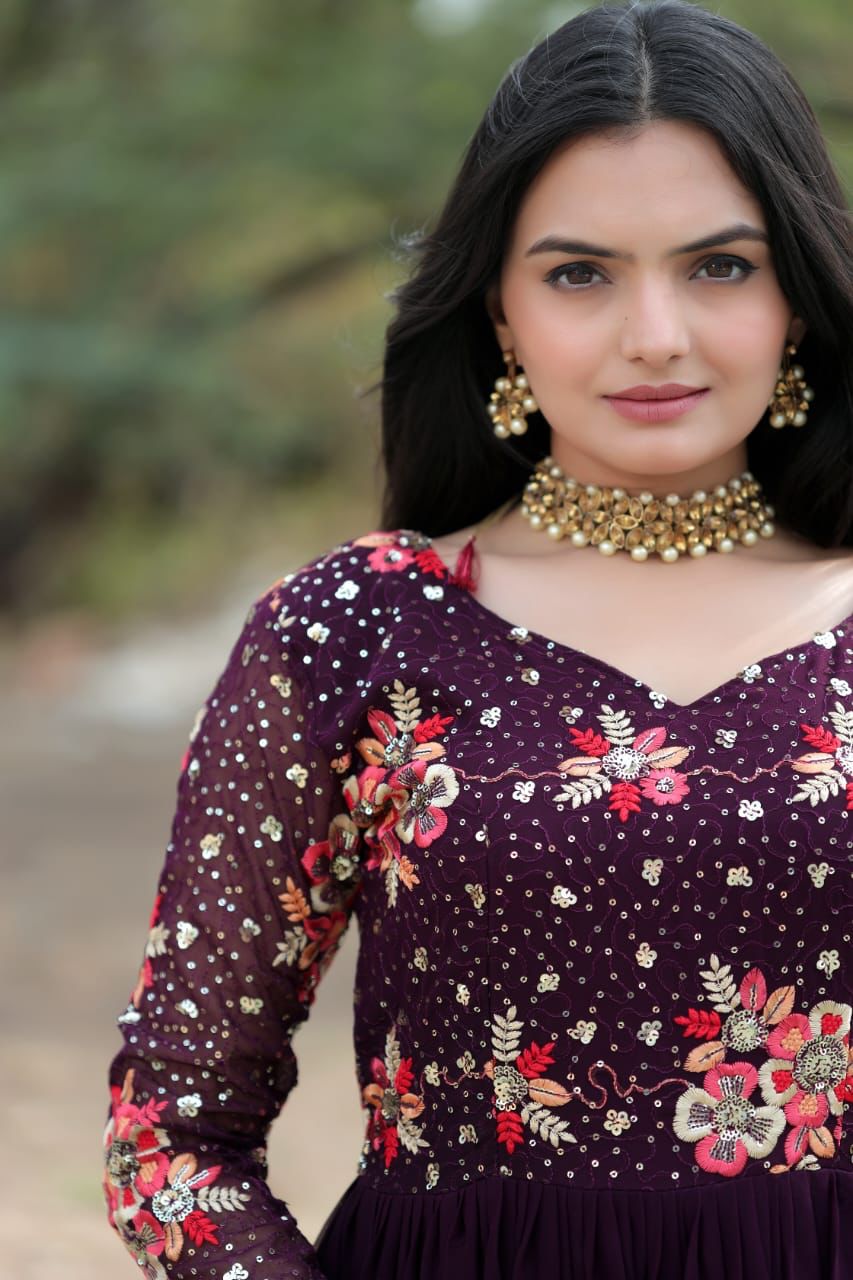 Radiant charisma embroidered sequin adorned double frill gown