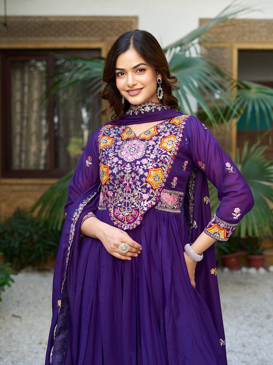 Pink heavy sequins thread embroidered georgette gown for wedding functions
