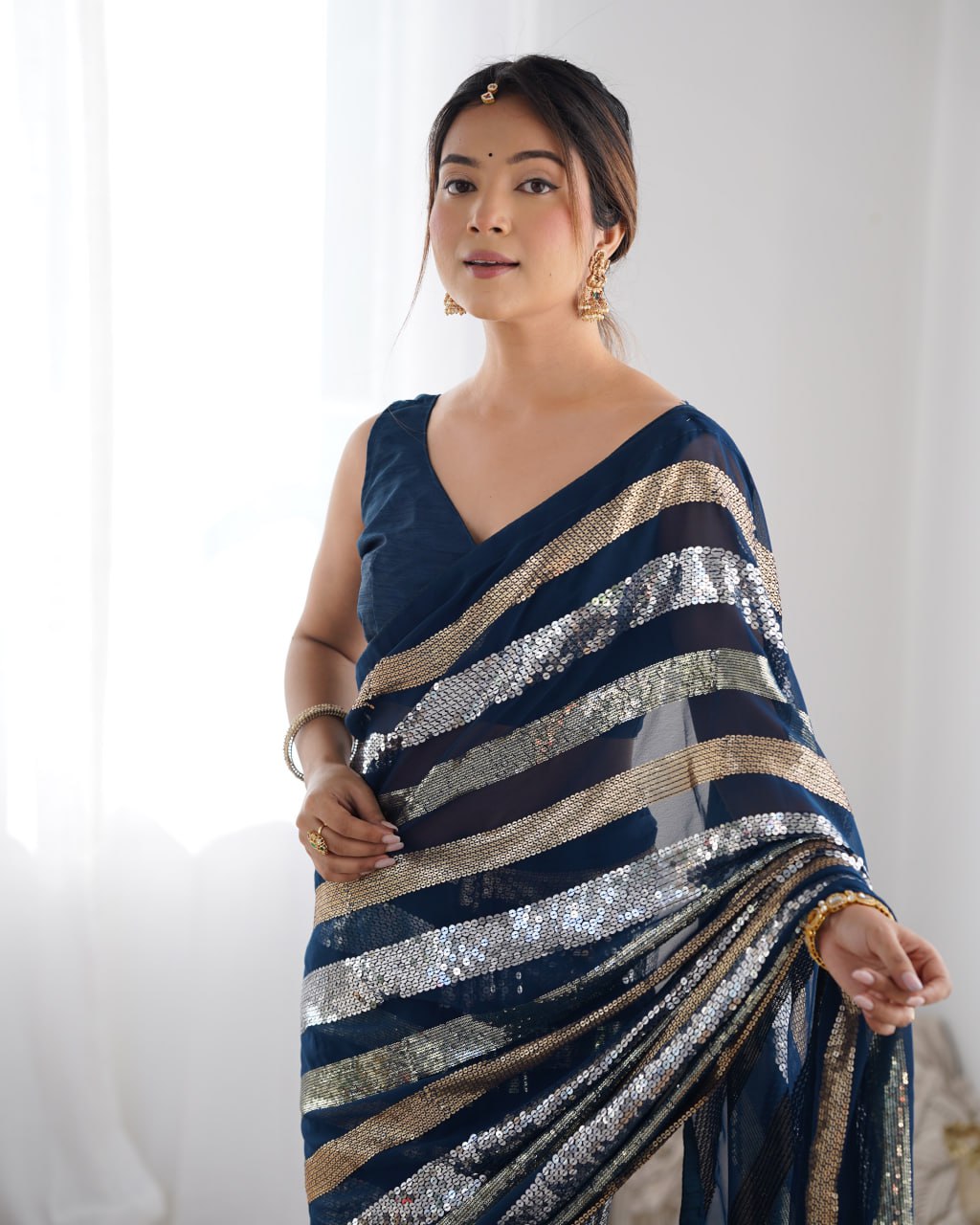 Navy blue georgette sequin embroidered Kira designer saree