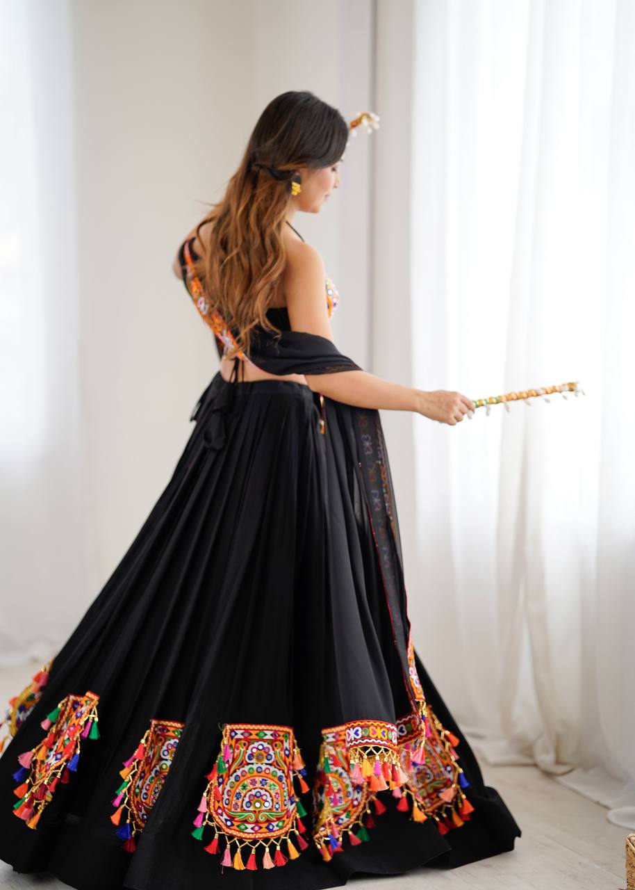 Black georgette lehenga choli with Gamthi embroidery and mirror work