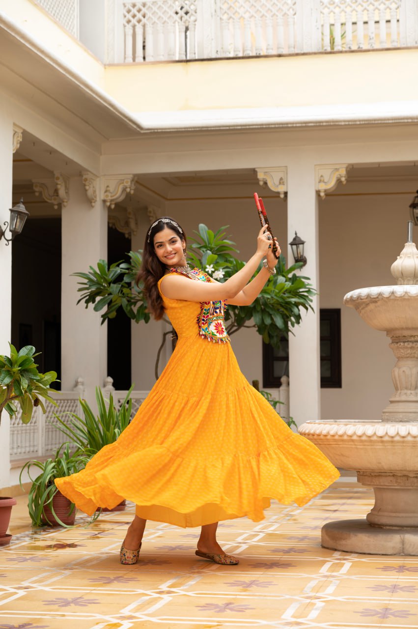 Yellow faux georgette Bandhani print Kutchi patch mirror work gown