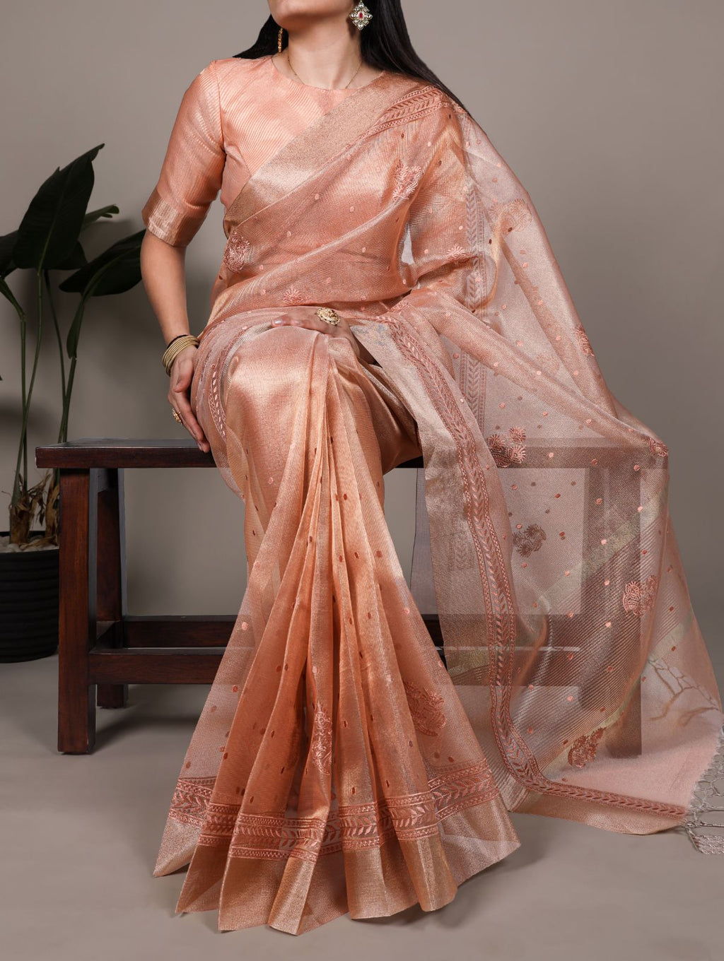 Orange poly shimmer thread embroidered saree with unstitched blouse