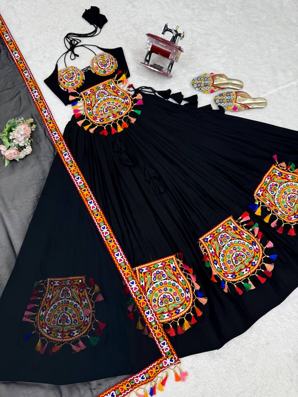 Black georgette lehenga choli with Gamthi embroidery and mirror work