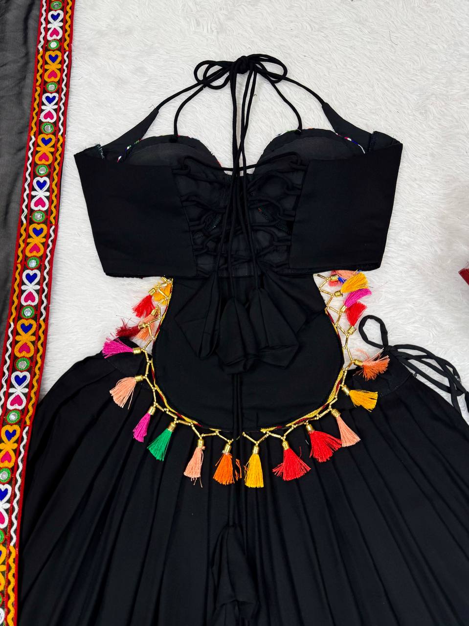 Black georgette lehenga choli with Gamthi embroidery and mirror work