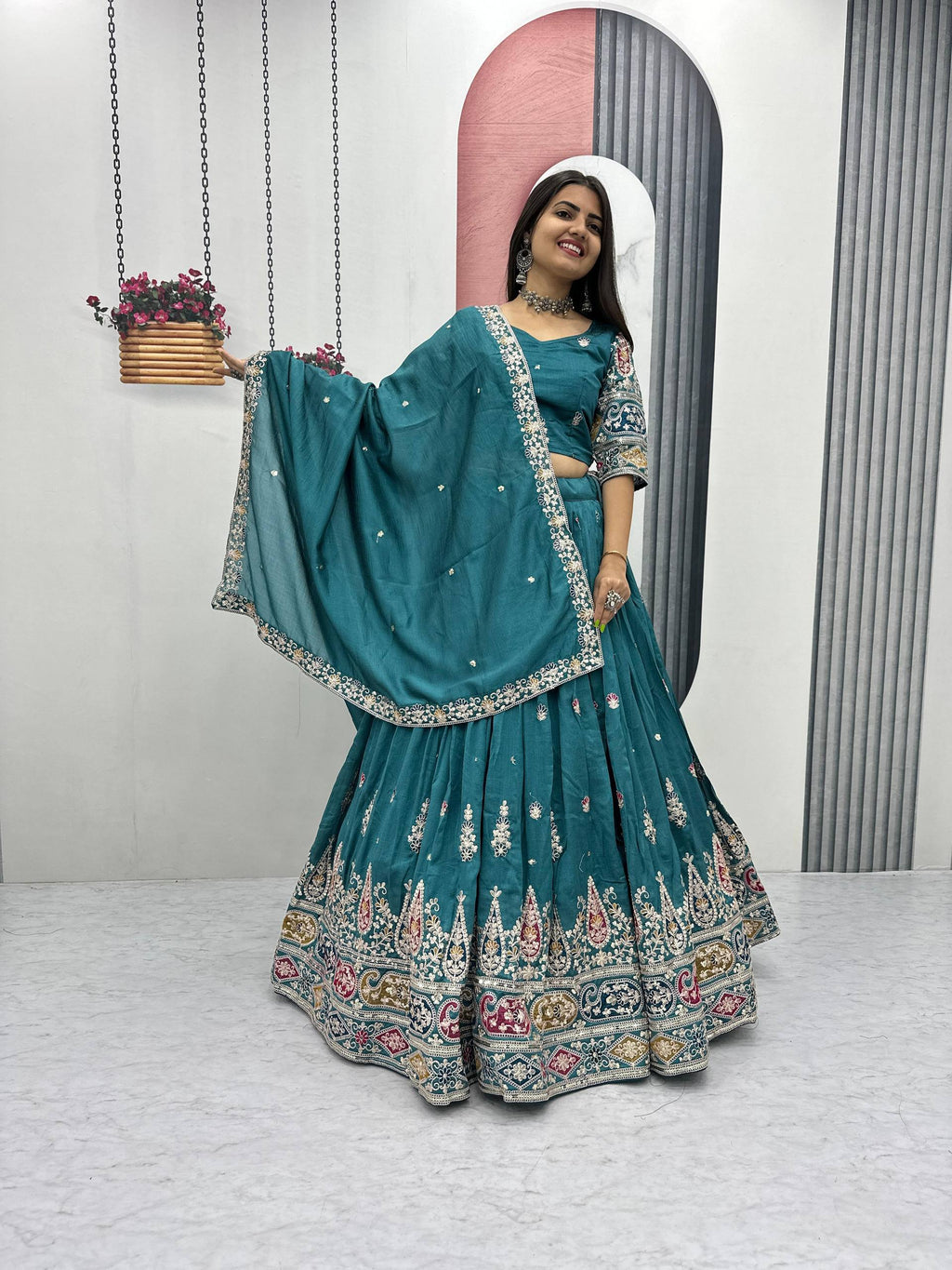 Raji teal green Vichitra silk lehenga choli with sequins thread embroidery and dupatta