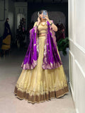 Cream silk lehenga choli with Paithani lace border and jacquard zari dupatta
