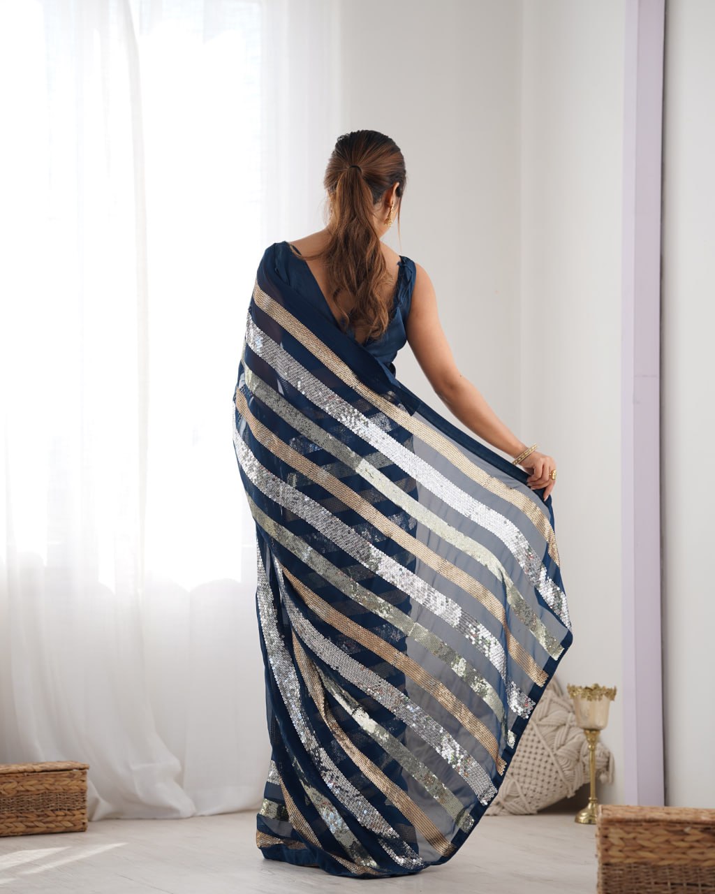 Navy blue georgette sequin embroidered Kira designer saree