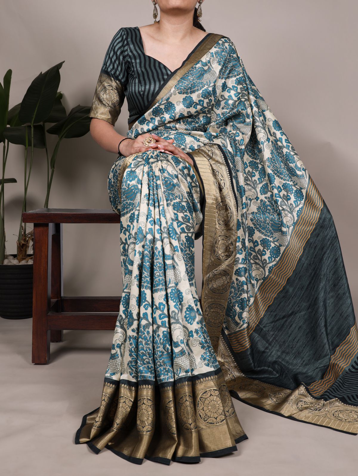 Teal blue tasar silk printed saree with viscose border and blouse