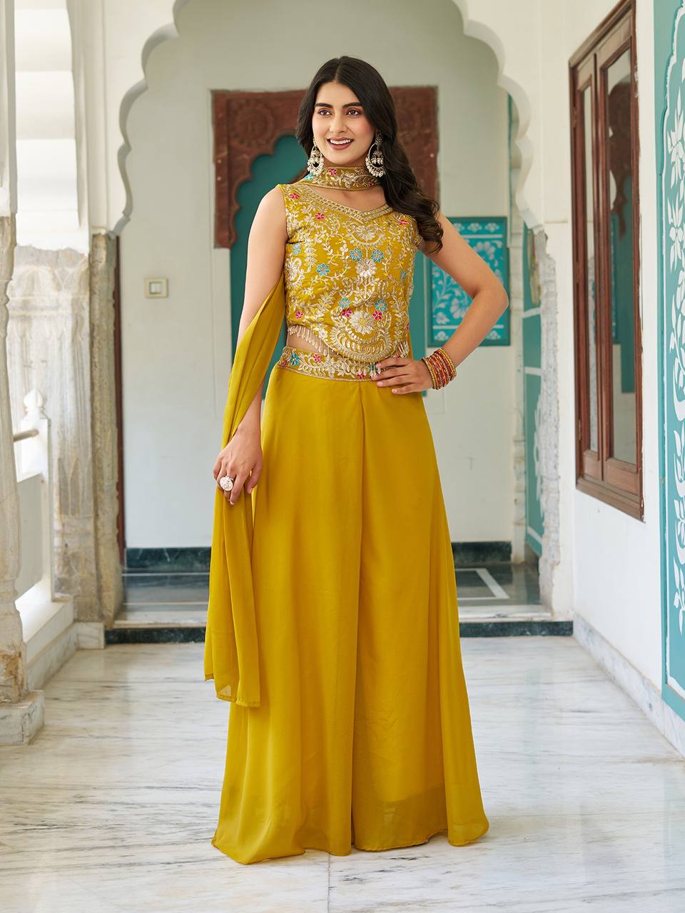Stuti mustard yellow star georgette top palazzo set with sequins thread embroidery