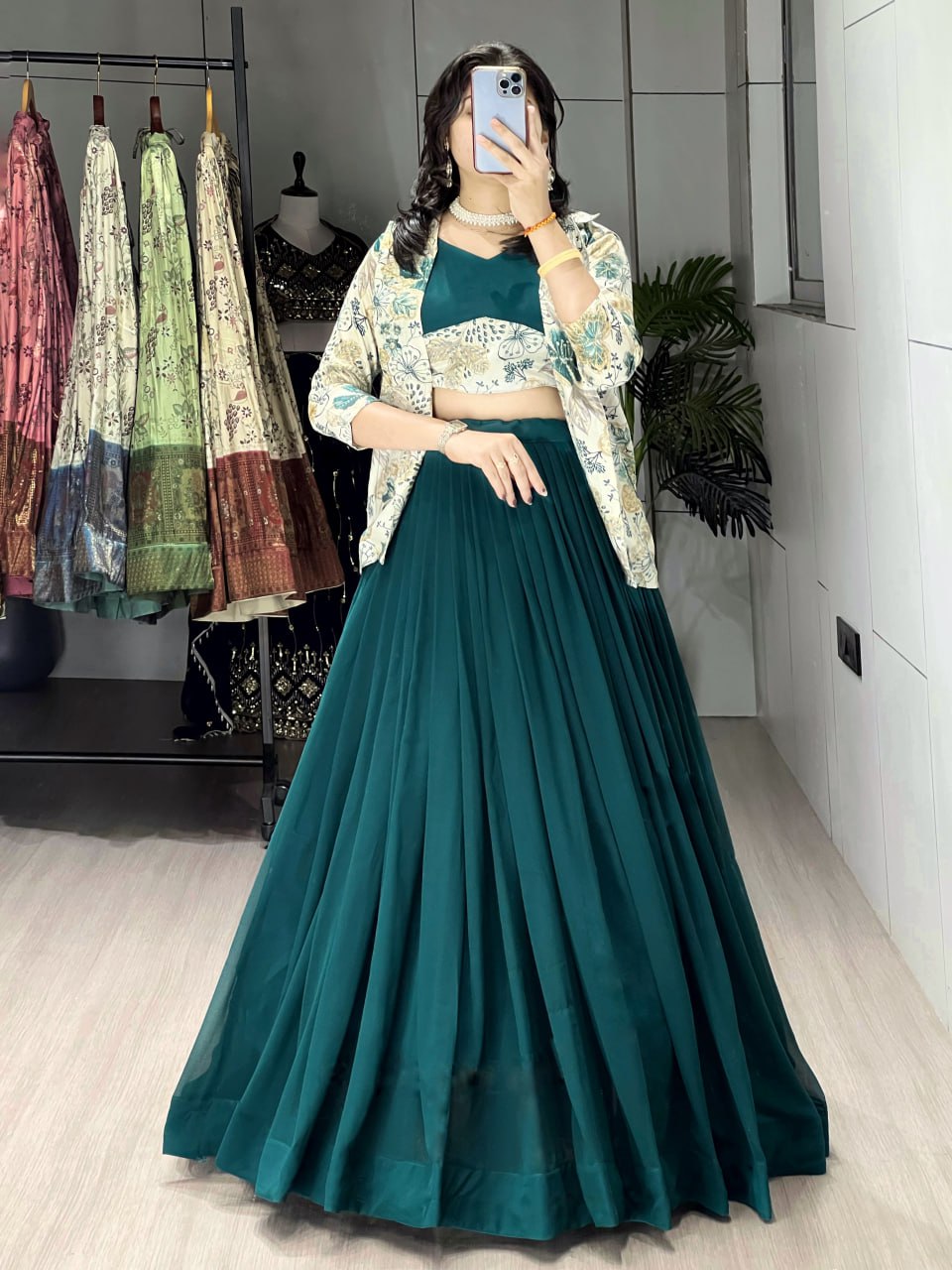 Alka teal green georgette foil printed lehenga choli with koti jacket