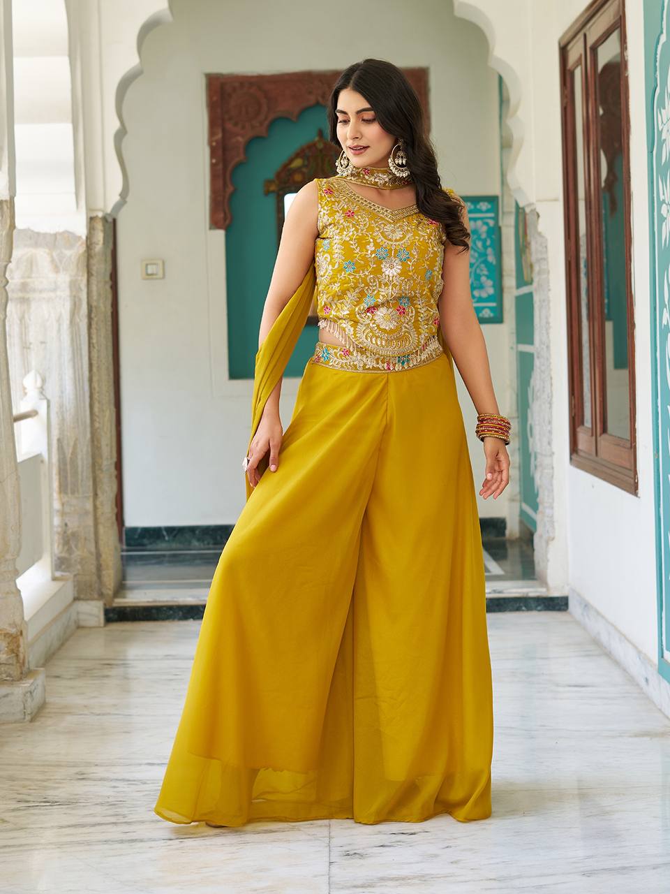Stuti mustard yellow star georgette top palazzo set with sequins thread embroidery