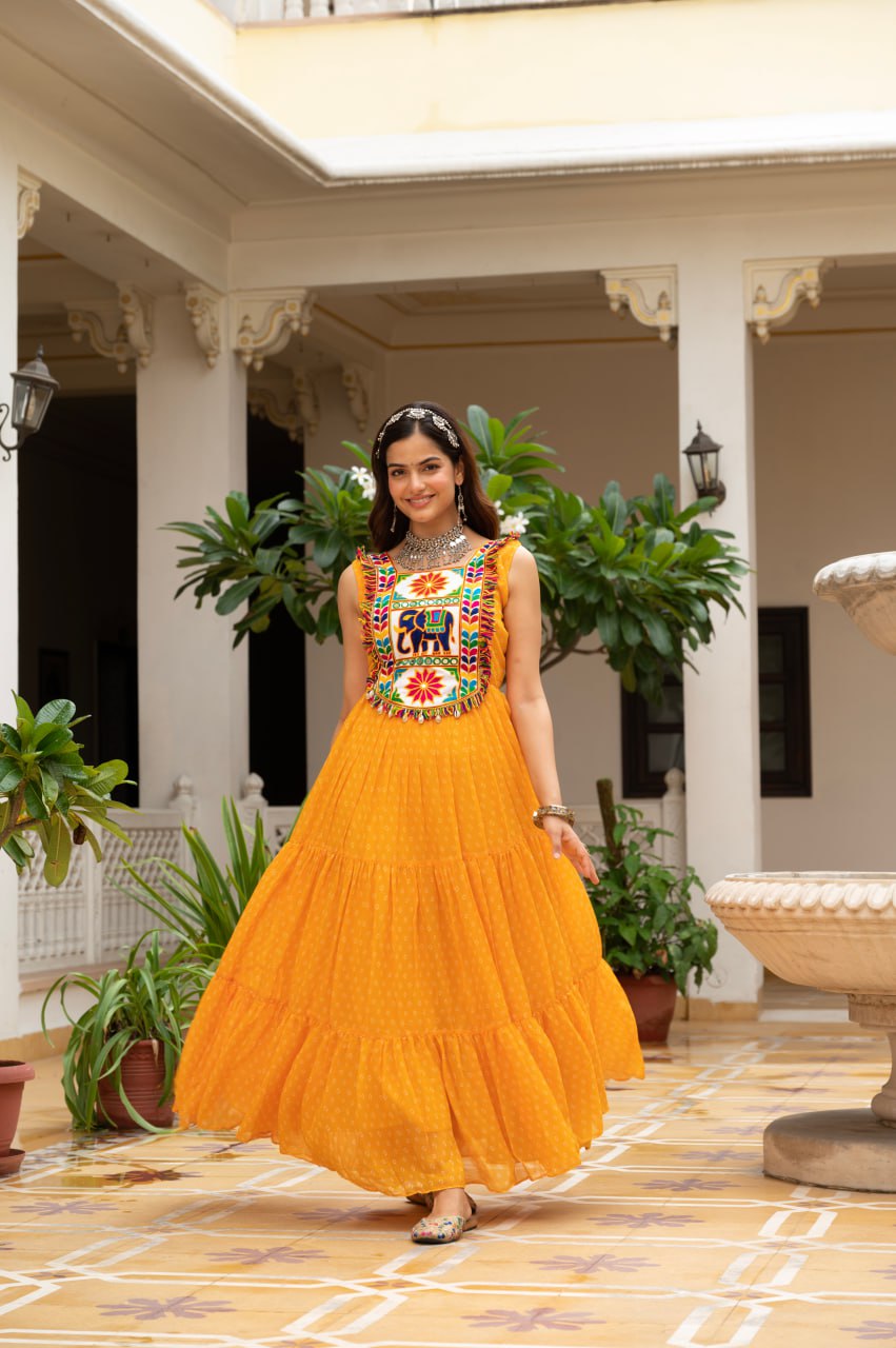 Yellow faux georgette Bandhani print Kutchi patch mirror work gown