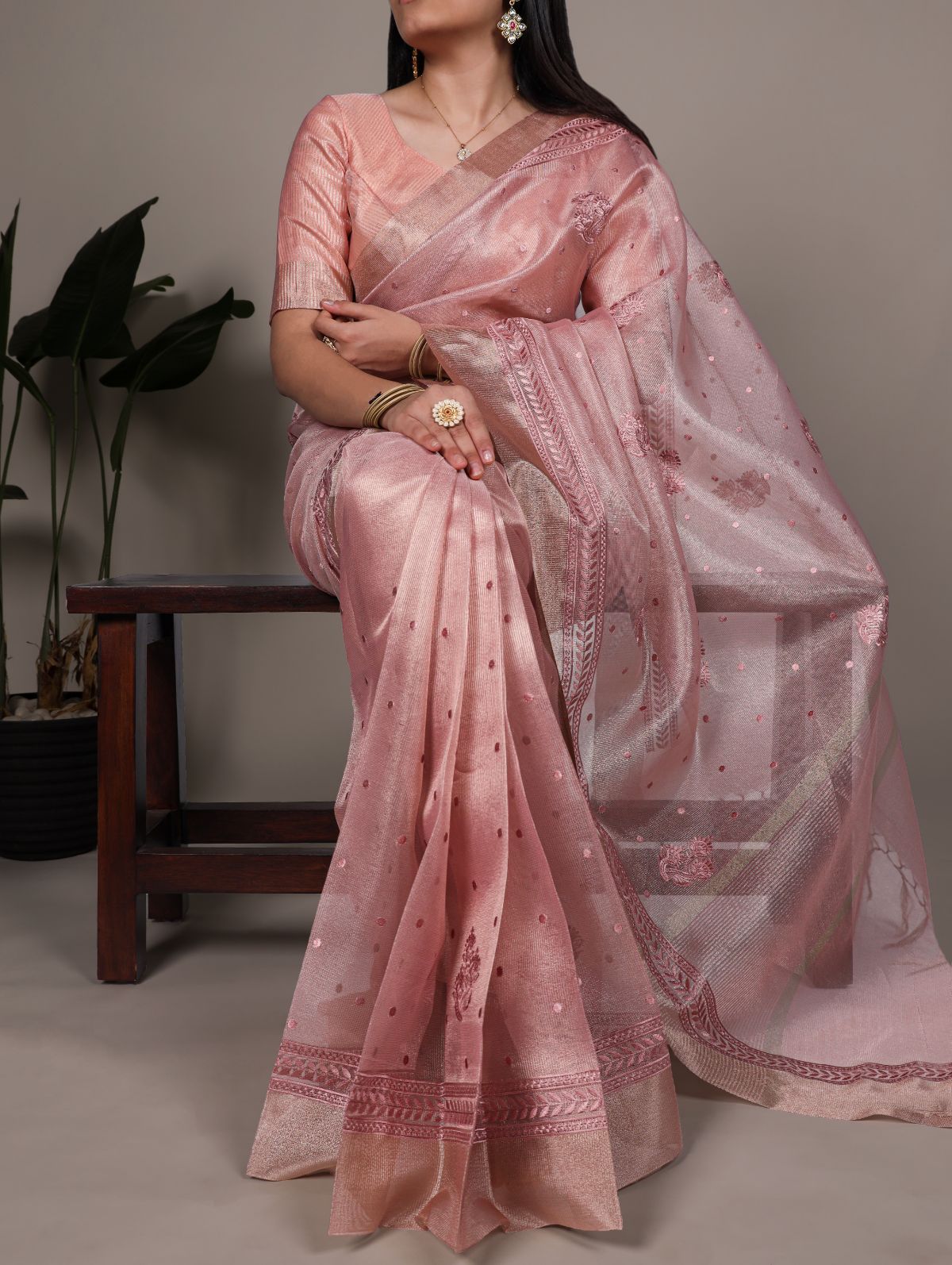 Light pink poly shimmer thread embroidered saree with unstitched blouse