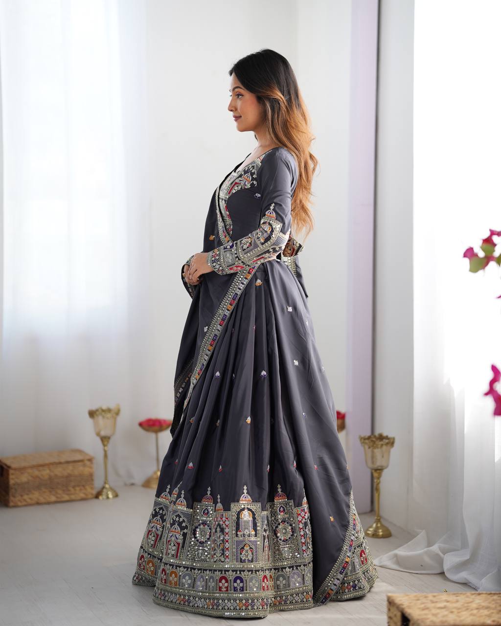 Kavyani Natural Crepe Silk Black Lehenga Choli Set – semi-stitched lehenga with 3-meter flair, cancan and canvas patta, intricately embroidered with coding dori, thread, and sequins; paired with unstitched matching choli and embroidered dupatta with lace border, premium festive and wedding ethnic wear for women by Trinaari.